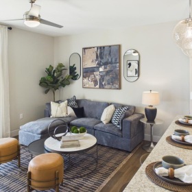 a living room with a couch and a table