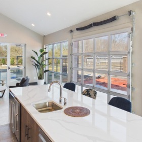a kitchen with a large island
