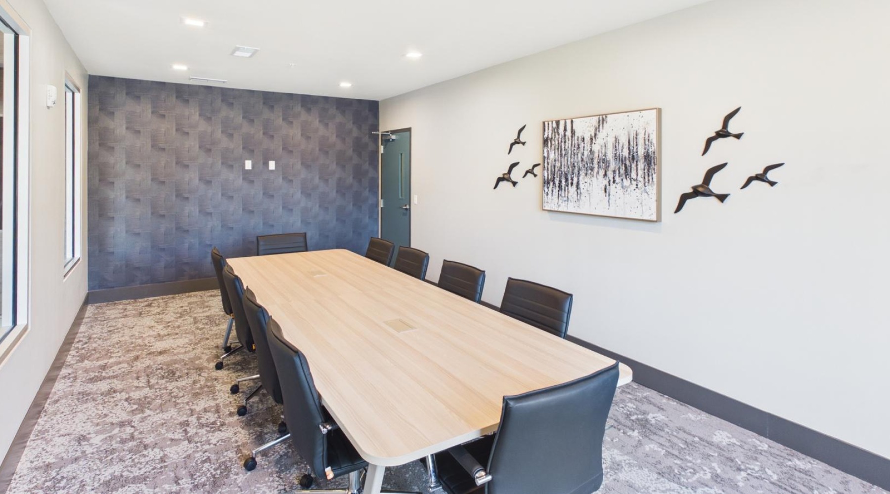 a room with a table and chairs